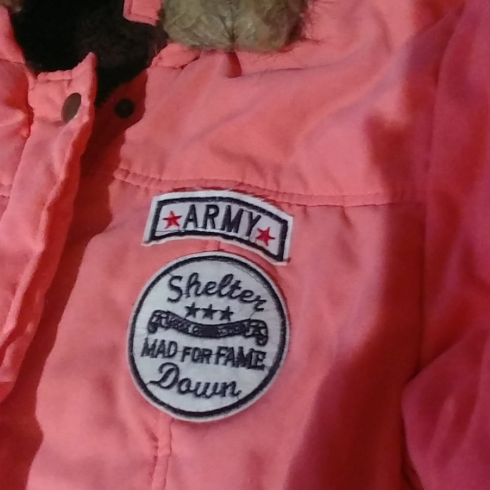 Very pretty color jacket. Faux fur trim.